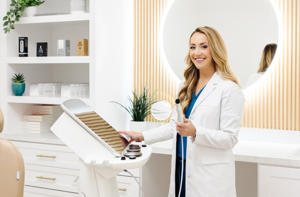 Dr. Blythe McPherson, founder, owner, and optometrist at Eyes on Westlake in Westlake, TX demonstrates a radiofrequency (RF) treatment device at the practice.