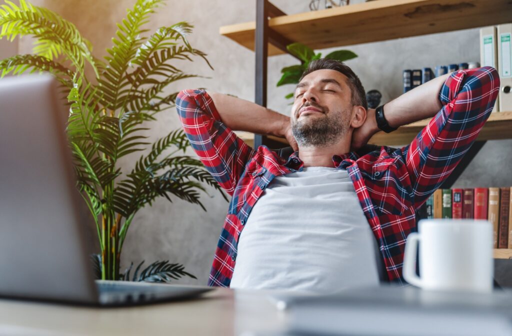 Adult taking a break from looking at their computer screen